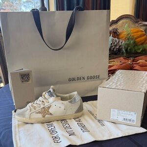 Golden Goose White and Gold Sneakers